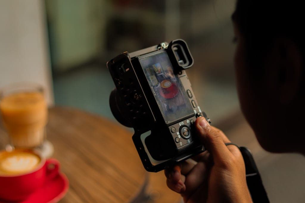 Cinematic photography setup featuring visual camera lens and warm backlighting